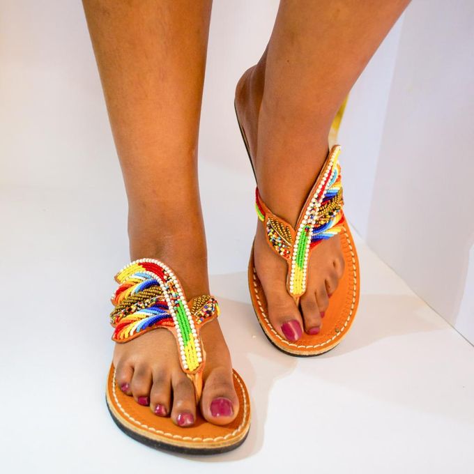 Made in Kenya Sandles with a Double heeled and beautiful beaded print sandles, providing comfort and durability.
